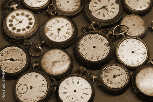 Old clocks on black and white