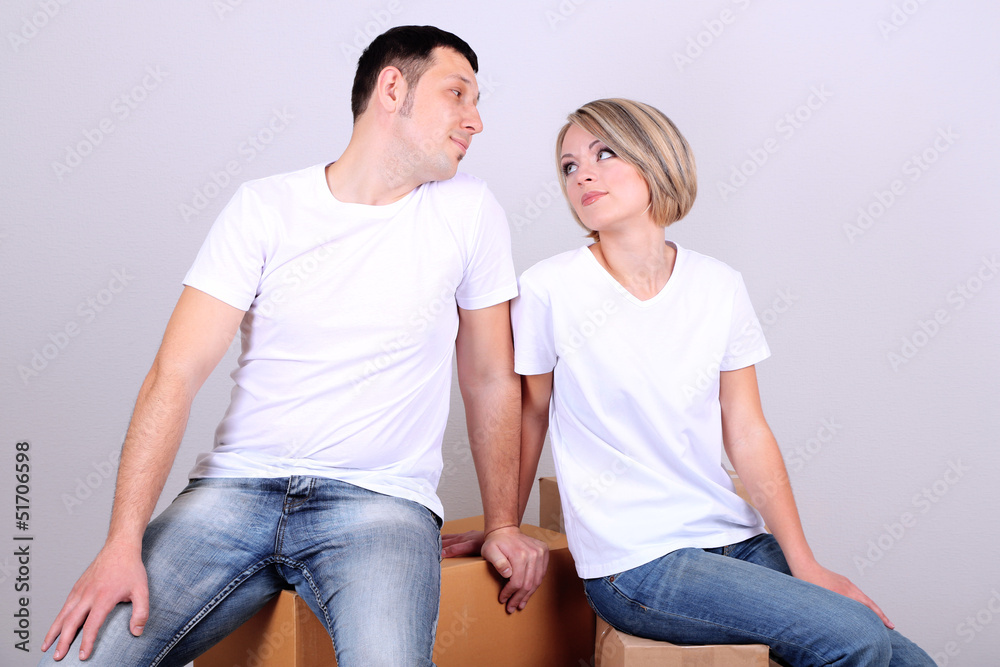 Young couple moving in new house Young couple moving in new house
