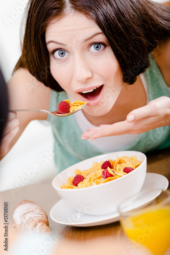 Girl eating healthy breakfast