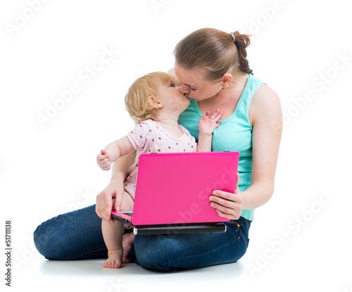 mother and child working at...