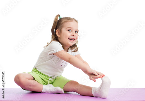 Kid girl doing fitness exer...