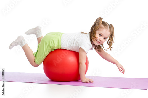 Kid having fun with  gymnas...