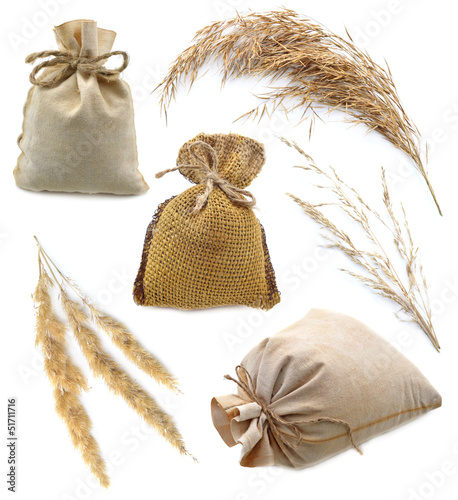 Foto Hessian sacks with herbs isolated