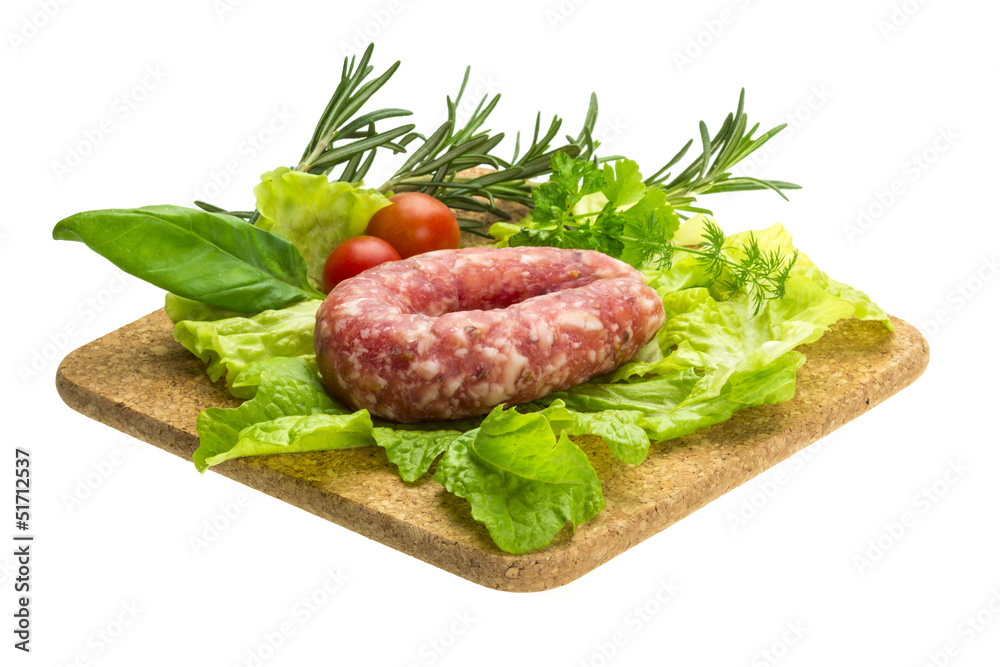 Salami with rosemary, salad and tomatoes Salami with rosemary, salad and tomatoes