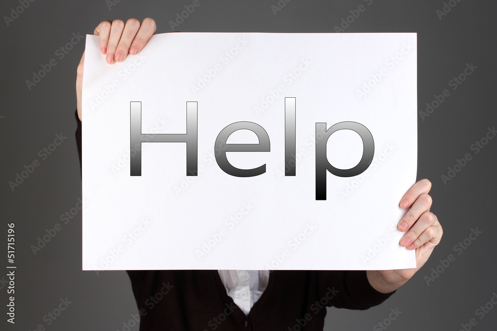 Woman holding paper with text in front of her face, Woman holding paper with text in front of her face,