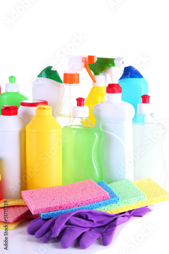 Different kinds of house cleaners and colorful sponges, gloves
