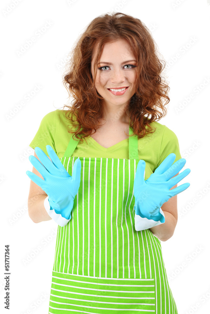 Young woman wearing green apron and rubber gloves, isolated Young woman wearing green apron and rubber gloves, isolated
