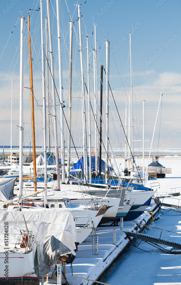 Luxury yachts on the coast in winter season. Tallinn marina Luxury yachts on the coast in winter season. Tallinn marina