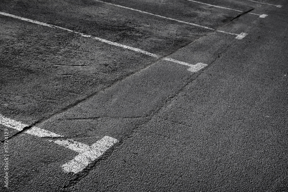 Fototapeta premium Empty parking places. Background texture
