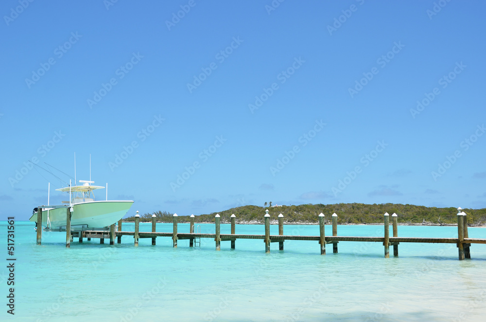 Yacht at the wooden jetty. Exuma, Bahamas Yacht at the wooden jetty. Exuma, Bahamas