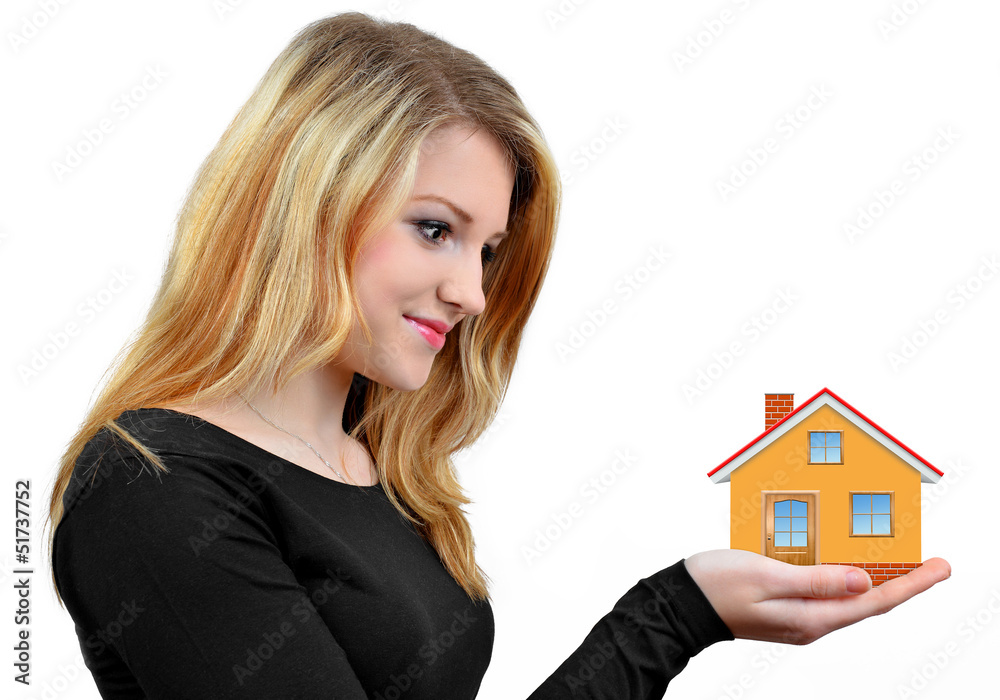 girls holding in hands house