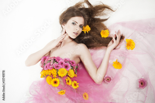 Beautiful woman with color flowers
