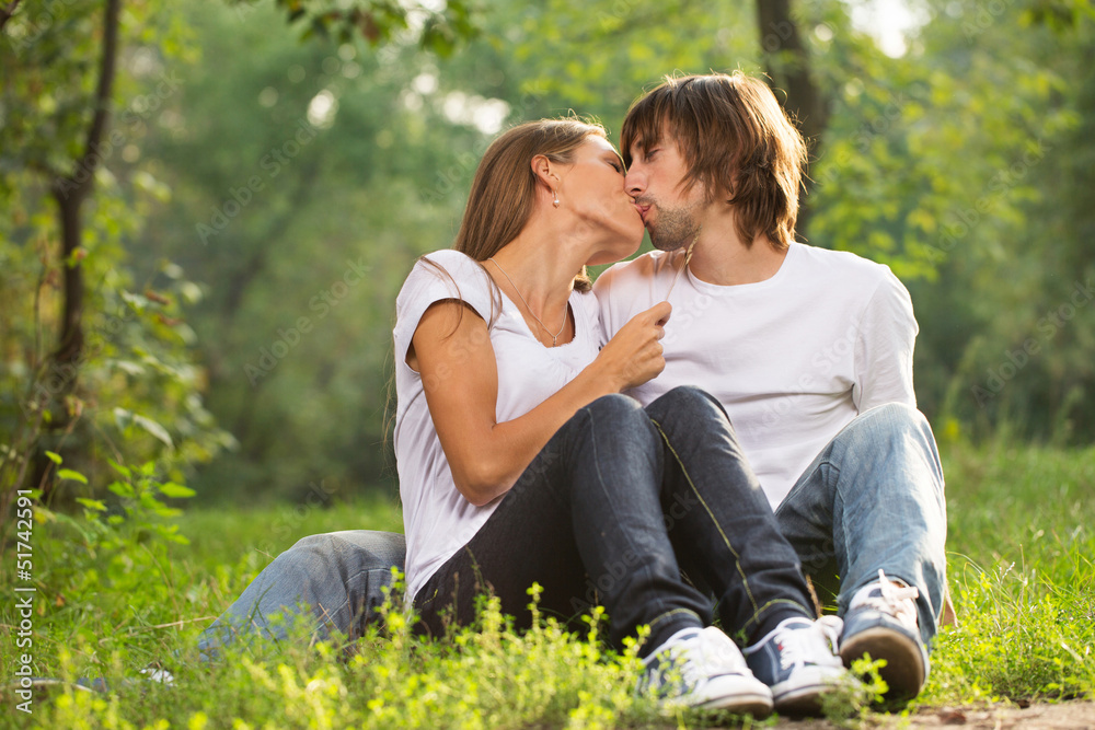 happy young couple kissing outdoor happy young couple kissing outdoor