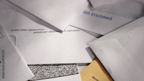 Dolly shot over unpaid bills