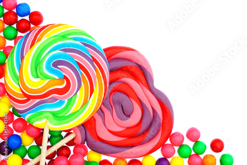 Colorful candy corner border with lollipops and gumballs