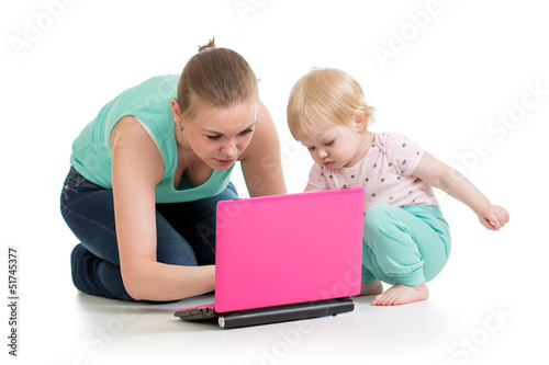 mother and child working at...