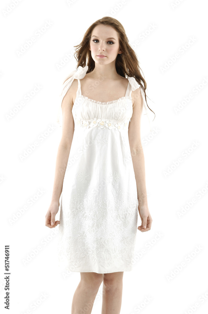 Young girl in white dress, isolated on white background