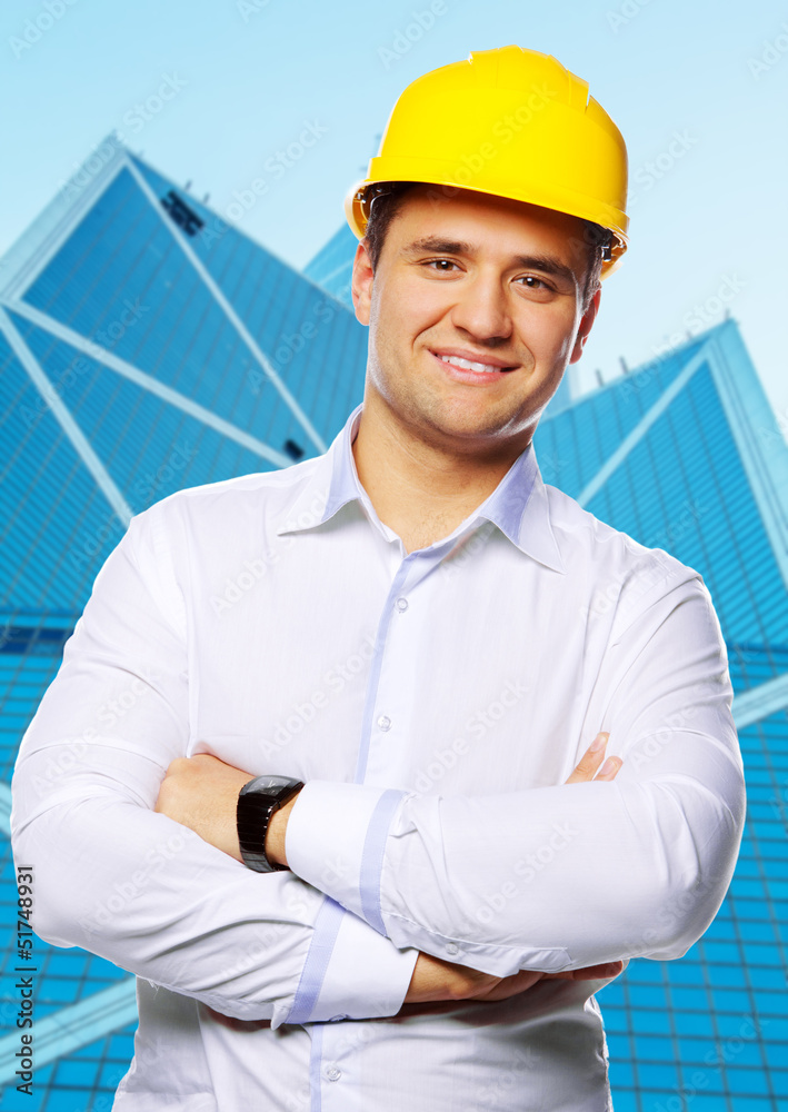 Portrait of happy young foreman in yellow hardhat Portrait of happy young foreman in yellow hardhat