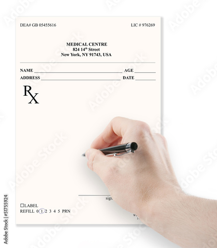 Doctor filling in empty medical prescription isolated