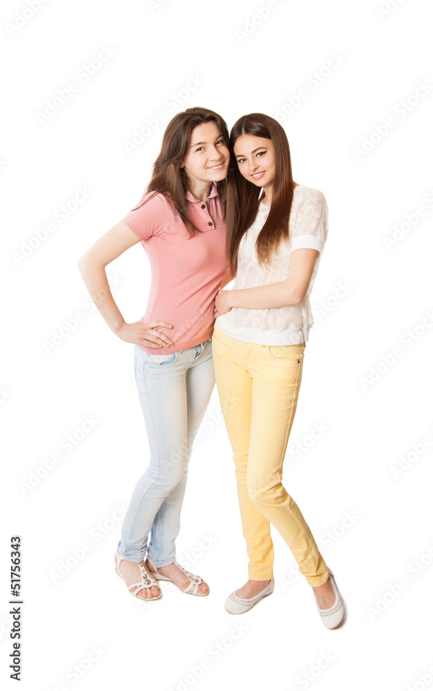 Two girl friends isolated on white Two girl friends isolated on white