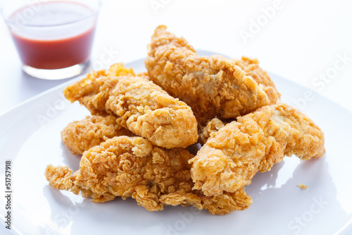 Принти на полотні Chicken Strips with Hot Pepper Sauce