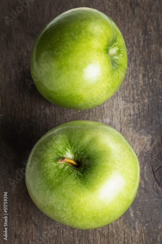 two ripe green apples close up photo