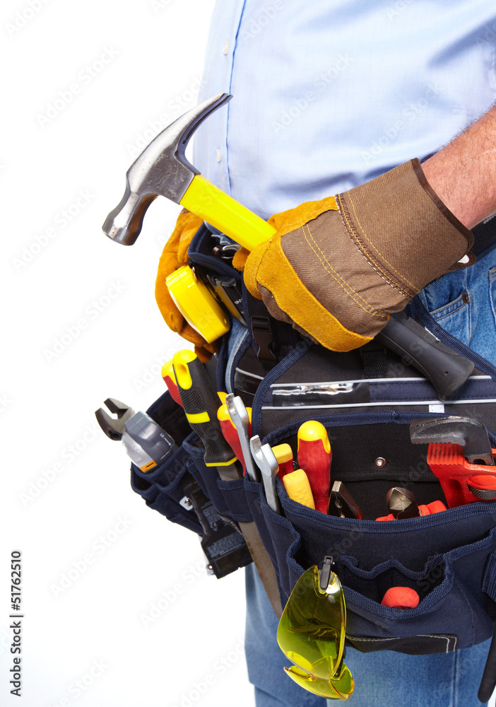 Worker with a tool belt. Construction.