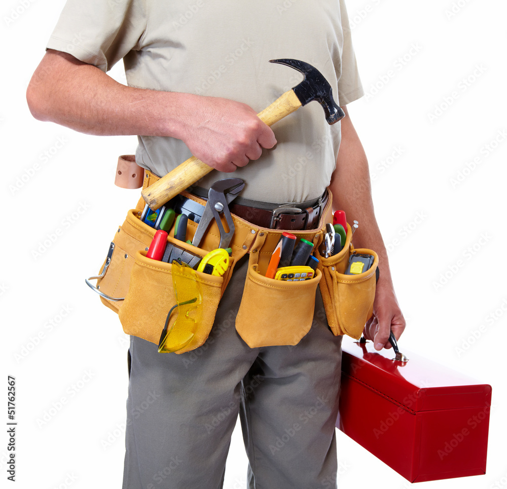Worker with a tool belt. Worker with a tool belt.
