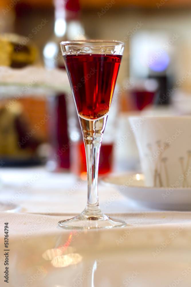 Naklejka premium cherry liqueur shot on the table