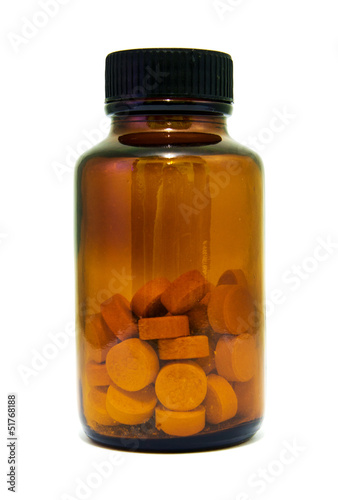 A half-full bottle of medicine pills
