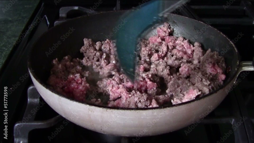 Left Handed Cook Stirring Ground Beef Left Handed Cook Stirring Ground Beef