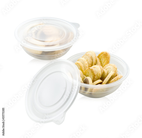 Cookies in the food storage bowl isolated on white