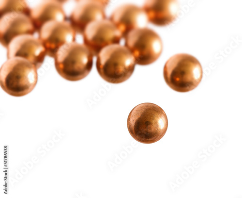 Metallic balls on white background