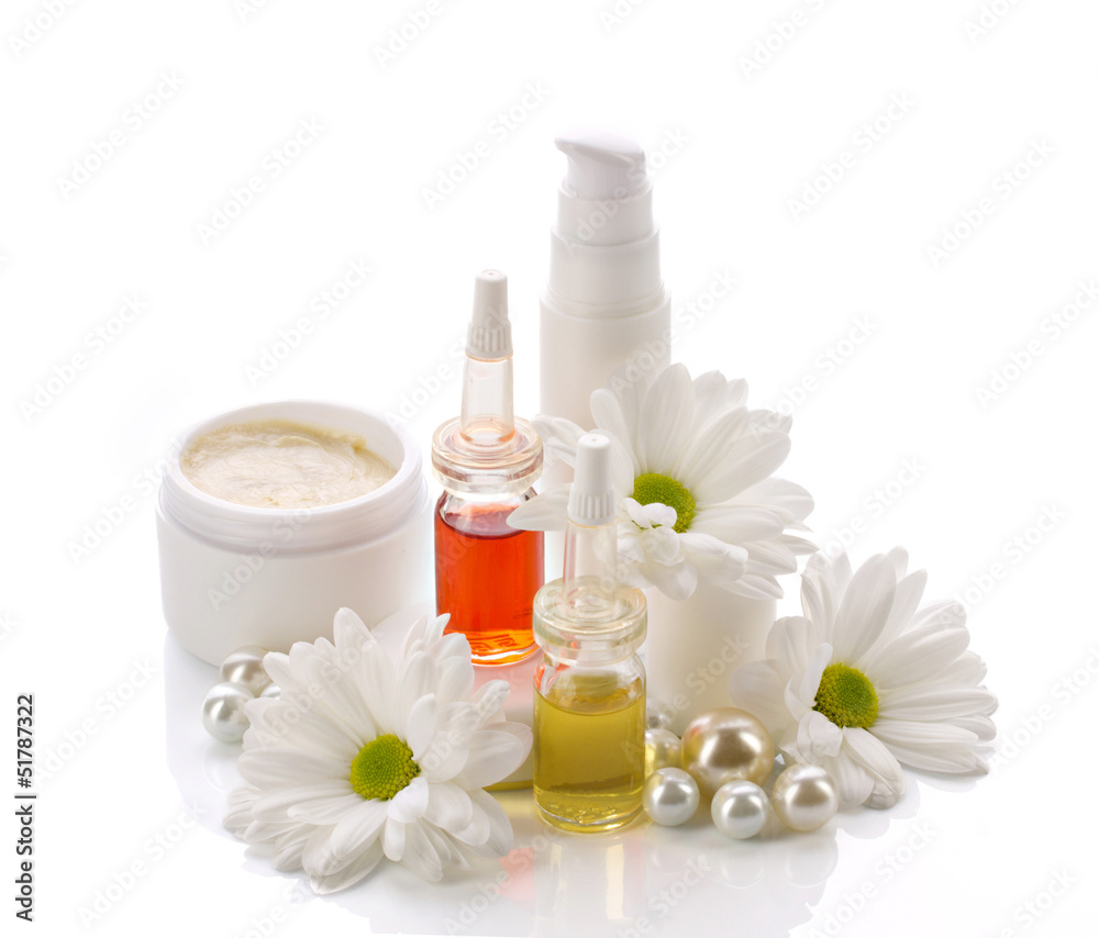 natural cosmetics products with pearls and flowers
