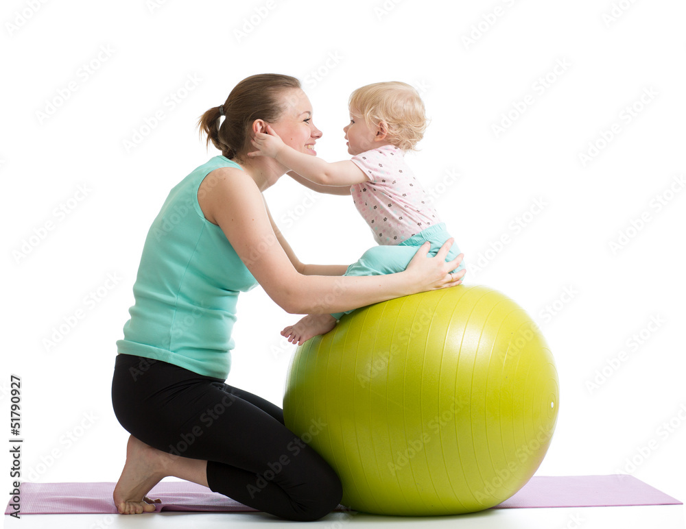 mother with baby having fun with gymnastic ball mother with baby having fun with gymnastic ball