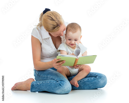 mother reading a book to he...