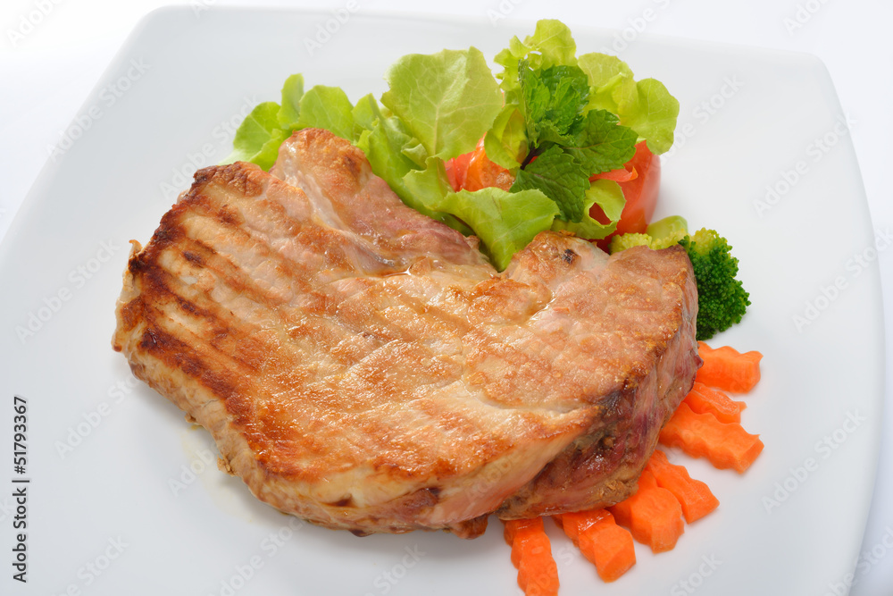 Grilled pork steak with vegetables Grilled pork steak with vegetables