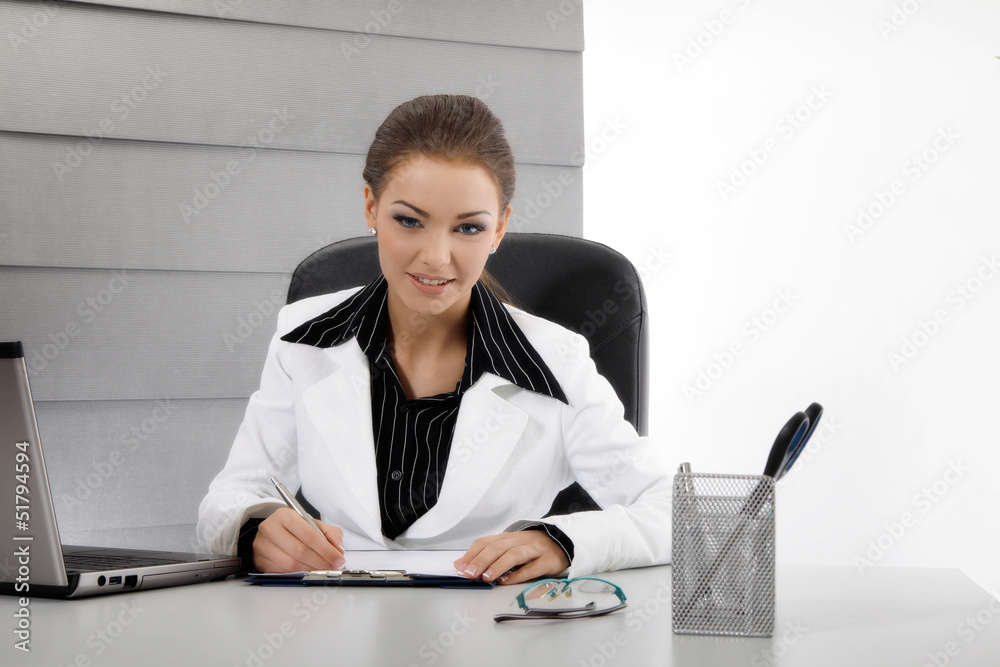 Young business woman working with documents