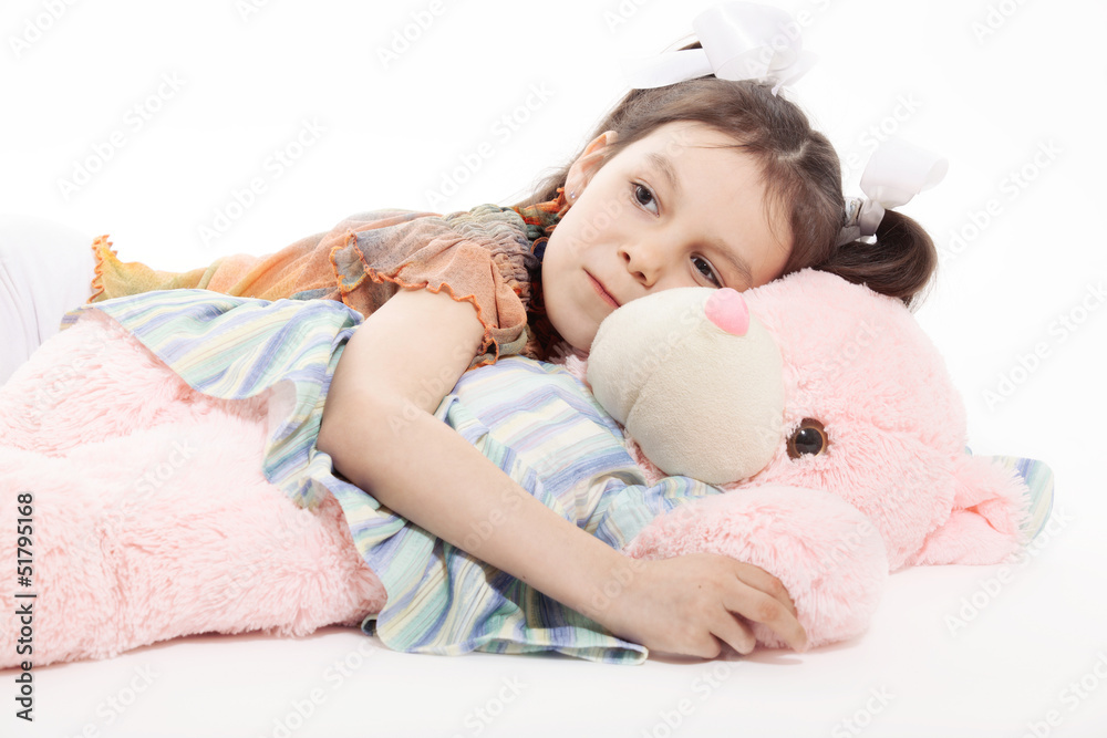 Little Girl And Teddy Bear on white background
