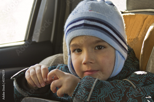 little boy in the car photo