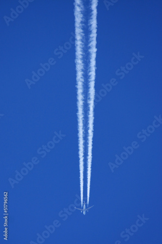 airplane and vapour trail