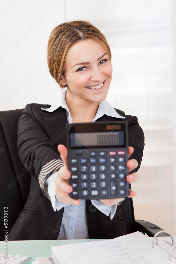 Businesswoman Showing Calculator Businesswoman Showing Calculator
