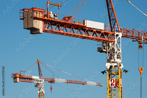 Tower cranes perspective photo