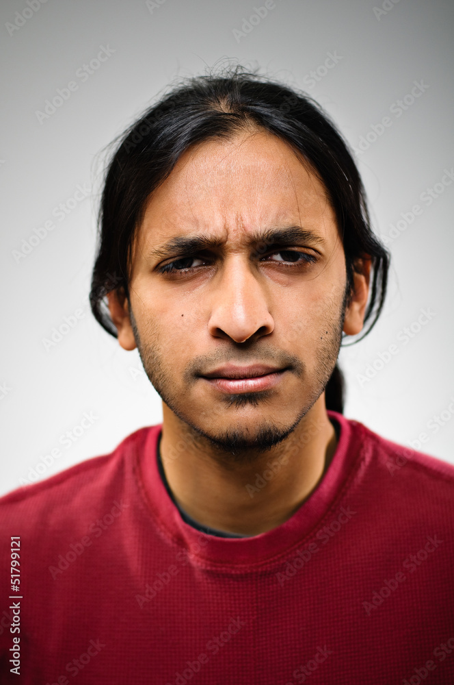 Young Indian Ethnic Man Squinting Portrait Young Indian Ethnic Man Squinting Portrait