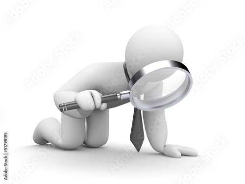 Businessman examines something