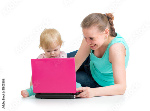 mother and child working at...