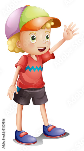 A boy wearing a colorful cap