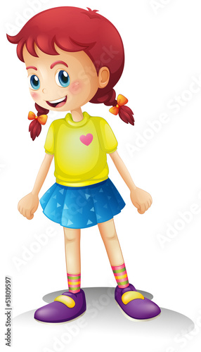 A smiling girl with a colorful dress