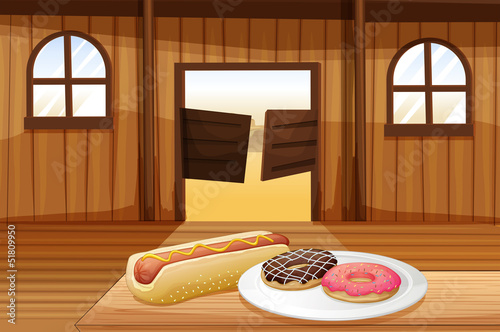 A saloon bar with foods in the table