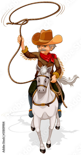 A cowboy riding a horse while holding a rope